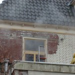 Verf verwijderen van gevel